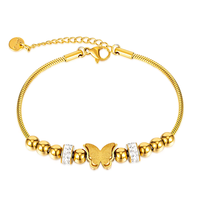 Bracelets de décoration de main de papillon givré de couleur d'or bracelet de petite boule d'acier de chaîne d'os de serpent d'acier pour des femmes