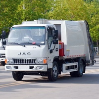 Camion de compression des déchets JAC 6CBM à alimentation automatique, camion de manutention de conteneurs à déchets, camion de ramassage des ordures ménagères pour l'assainissement communautaire