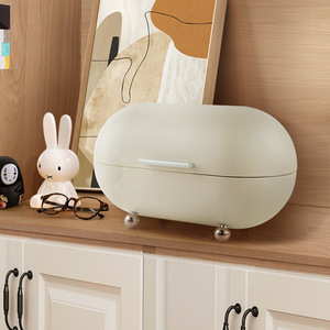 Petite boîte à pain ovale blanc crème, organiseur de rangement pour salon, utilisation sur bureau, avec pieds en métal - Product Image 1
