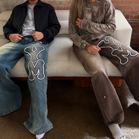 Jeans personnalisés OEM Streetwear avec logo lettres imprimées en relief, délavés à l'acide, vintage, coupe ample, en denim épais pour hommes