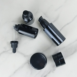 Botellas de Vidrio Violeta Oscuro de Lujo de 30 ml, 50 ml y 100 ml para Aceites Esenciales con Gotero y Pulverizador, y Tarro para Crema Facial - Product Image 1