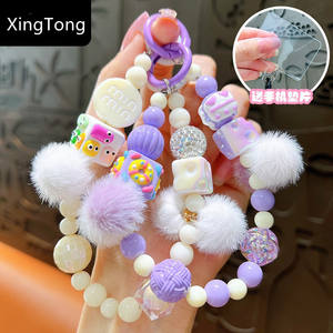 أزياء إبداعية حروف دمية يدوية زغب الخرز الكرة مرسومة حقيبة إكسسوارات معلقة سماعة أذن سوار مطرز سلسلة مفاتيح - Product Image 1