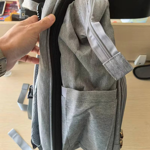 Free sample Taking the Case This multipurpose tote bag has several pockets for storing the majority of common <b>sewing</b> <b>machines</b> - Product Image 3