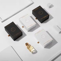 Emballage personnalisé pour huile de parfum pour homme, boîte-cadeau magnétique de luxe recyclable doublée d'une éponge avec logo imprimé en or noir