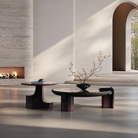 Table basse en dalle de pierre minimaliste italienne : une table basse ronde luxueuse et artistique pour le salon