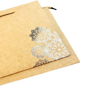 Custom Silver Pattern <b>Brown</b> Kraft Cheap Paper Shopping Bags With Twisted Rope Handle Fancy design kraft paper bag for clothing - Product Image 3
