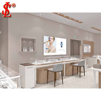 Vitrine de présentation de bijoux de luxe, écologique et personnalisable, en verre blanc laiteux, comptoir îlot avec éclairage LED, mobilier de magasin de détail