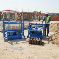 Machine à fabriquer des briques à emboîtement manuelle utilisée pour la construction pour le ciment, le sable, le béton, matière première, état neuf