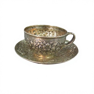 Taza y platillo de té de latón de calidad exclusiva con diseño en relieve, forma personalizada, del mejor exportador de la India. - Product Image 1