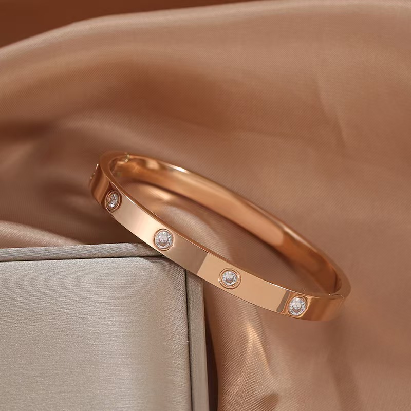 Rose gold wide edition diamond