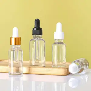 Vuoto 15ml 30ml 50ml bottiglie di vetro olio per capelli contagocce imballaggio per cosmetici