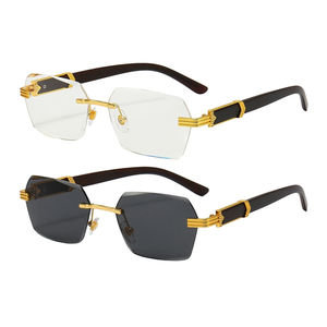 نظارات شمسية كلاسيكية عصرية جديدة بدون إطار أزرق شفاف إطار معدني UV400 العدسات الأكثر مبيعًا بالجملة كبيرة الحجم للرجال والنساء - Product Image 3