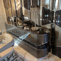 Console haut de gamme incurvée avec miroir en acier inoxydable, meuble d'entrée de luxe pour hall d'hôtel et villa