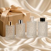 Lot de 4 flacons de parfum cylindriques en verre transparent, gaufrés, vides et rechargeables pour huiles d'aromathérapie