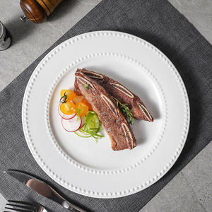 Assiette en céramique blanche pure à motif de perles en relief pour dîner occidental, steak, petit-déjeuner simple, usage domestique et fêtes - Product Image 1
