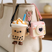 Porte-monnaie en silicone 3D multi-formes Kawaii avec logo personnalisé, vente en gros, mini porte-clés pour écouteurs, cadeau promotionnel pour enfants et femmes