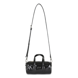 Bolso bandolera negro brillante de calidad coreana en estilo duffel redondo con correa de hombro desmontable y botones a presión. - Product Image 1