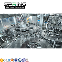 Machine de remplissage de bouteilles en verre et de canettes pour boissons gazeuses, sodas, bières et autres boissons gazeuses au CO2