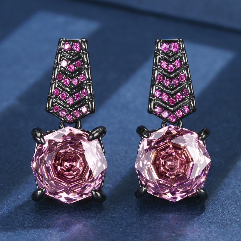 Boucles d'oreilles en or noir et roses séchées
