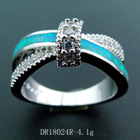 Bague de mariage et de fête en argent sterling 925 plaqué or blanc et rhodium avec opale de feu et CZ en croix