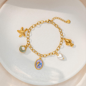 Nouveau bracelet en or plaqué 18 carats avec perle de dauphin pour femmes, bracelet multi-breloques en acier inoxydable, merveilles de l'océan - Product Image 4