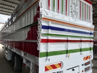 Semi-remorque plateau Huiteng 3 essieux 40 pieds 40 tonnes, service OEM, qualité fiable pour le transport de conteneurs