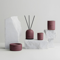 Diffuseur de parfum d'ambiance minimaliste en céramique AIKUN avec bâtonnets en fibre noire pour la décoration de chambres d'hôtel et de spas