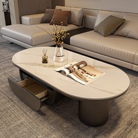 Table basse ovale en dalle de roche style crème moderne, mobilier de salon haut de gamme minimaliste et luxueux
