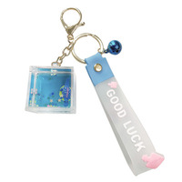 Magnifique porte-clés en acrylique avec liquide flottant, décoration clochette, sangle en PVC personnalisée, pendentif délicat pour sac à paillettes liquides.