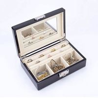 Boîte à bijoux en cuir PU noir avec miroir et serrure, plusieurs compartiments, personnalisable avec logo et couleurs, OEM/ODM disponible pour bagues