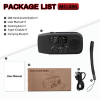 Radio AM/FM d'urgence extérieure avec lampe de poche solaire et à manivelle Conception portable Fonction de batterie externe en matière plastique
