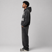 Sudadera con capucha extragrande y corte holgado, personalizada con pedrería, de 450 g/m² de alto gramaje, con bordado de apliques, negra, con lavado ácido y cremallera.