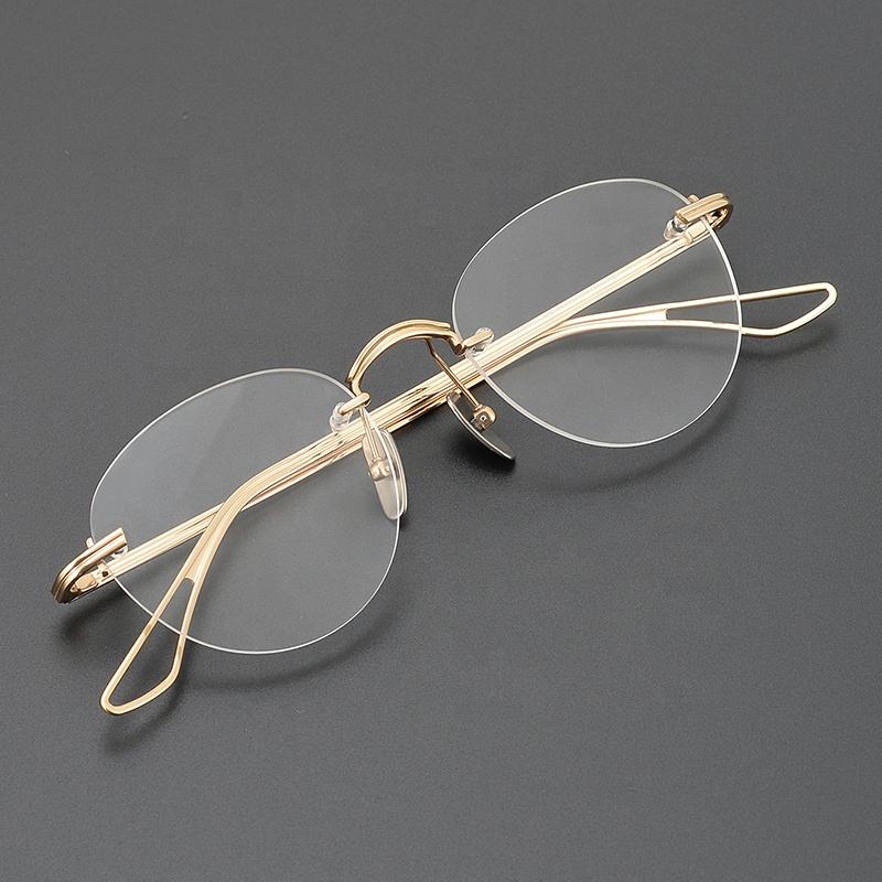 Gafas de titanio para miopía, lentes ópticas con montura sin marco,  redondas, a la moda, 2023