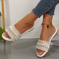 Sandales élégantes pour femmes, nouvelle collection, avec boucles perlées, polyvalentes, couleur unie, empeigne en cuir synthétique décorée de métal