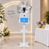 Photomaton professionnel à écran tactile avec éclairage LED, appareil photo reflex numérique, kiosque selfie tout-en-un pour location de mariage, fête ou événement.