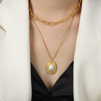 Collier chic vintage plaqué or à double rangs de chaînes, pendentif ovale imitation perle texturée, en acier inoxydable