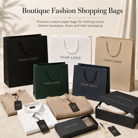 Sac en papier texturé de luxe avec estampage à chaud, poignée en ruban et boîte en carton rigide pour boutique de vêtements de luxe