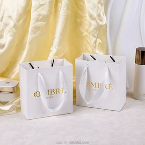 Sac en papier kraft de luxe imprimé personnalisé tendance 2025, sac cadeau en papier avec poignée en ruban pour sac de shopping - Product Image 4