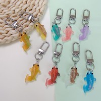 Lot de 100 porte-clés en forme de poisson coloré, adorables petits breloques animaux marins, idéaux pour les cadeaux de fête