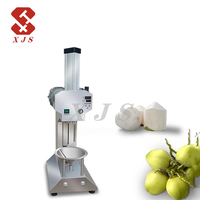 Machine à peler les noix de coco à haute efficacité, équipement industriel de découpe des noix de coco pour ligne de production d'eau de coco