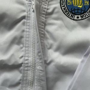 Uniforme de Taekwondo ITF de 1ère année Quteng avec <span class=keywords><strong>ceinture</strong></span> <span class=keywords><strong>noire</strong></span>, matière côtelée <span class=keywords><strong>Dan</strong></span>, unisexe, uniforme professionnel d'entraînement ITF Taekwondo - Product Image 2