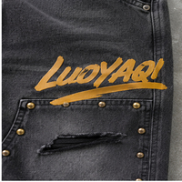 Jeans en denim pour hommes, coupe décontractée, jambe large, déchirés, cloutés, effet délavé vintage noir, imprimé graphique streetwear, personnalisés, style urbain, vente en gros