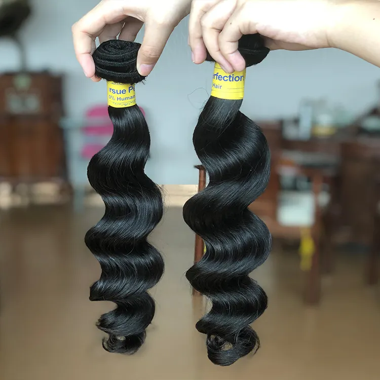Wholesale cheap brazilian virgin natural remy human hair extensions,loose wave human hair bundle with closure for black women