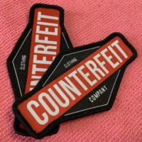 Patch de casquettes d'étiquettes tissées à bordure Merrow de toute forme, logo de la meilleure société de qualité, insigne de vêtements textiles pour pardessus