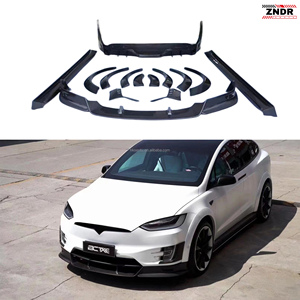 ชุดแต่งตัวถังรถยนต์ Tesla Model X ปี 2016-2018 คุณภาพสูง ผลิตจากคาร์บอนไฟเบอร์ ประกอบด้วยลิ้นหน้า สเกิร์ตข้าง ดิฟฟิวเซอร์หลัง และบังโคลน แบบยึดติดด้วยสกรู - Product Image 1
