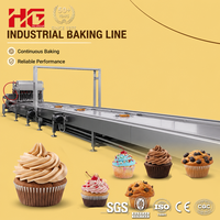 Ligne de cuisson entièrement automatique pour cupcakes en mousse HG avec système de dépose et de décoration de crème