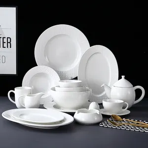 Grosir Set alat makan porselen putih bulat timbul piring meja restoran dekorasi keramik Set piring makan malam