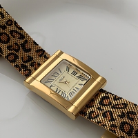 Montre de créateur à imprimé léopard doré, tendance audacieuse, élégante, quartz, style vintage, acrylique, résistante à l'eau 30M