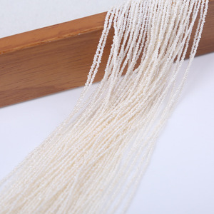 Vente directe du fabricant, perles d'eau douce ultra petites de 1 à 1,25 mm, perles blanches semi-finies, chaînes de perles pour le bricolage - Product Image 2