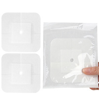 Pansement adhésif perforé intégré en tissu non tissé pour tube de drainage ; Pansement de fixation pour cathéter externe de dialyse péritonéale